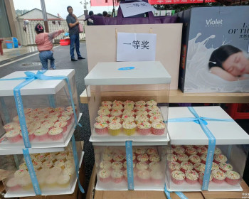 慈利县居安物业在温泉华府小区举办端午节包粽子比赛